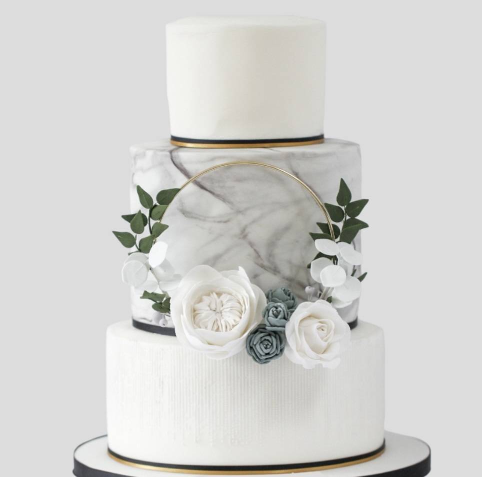 Elegant white and grey marble wedding cake, bespoke wedding cakes London