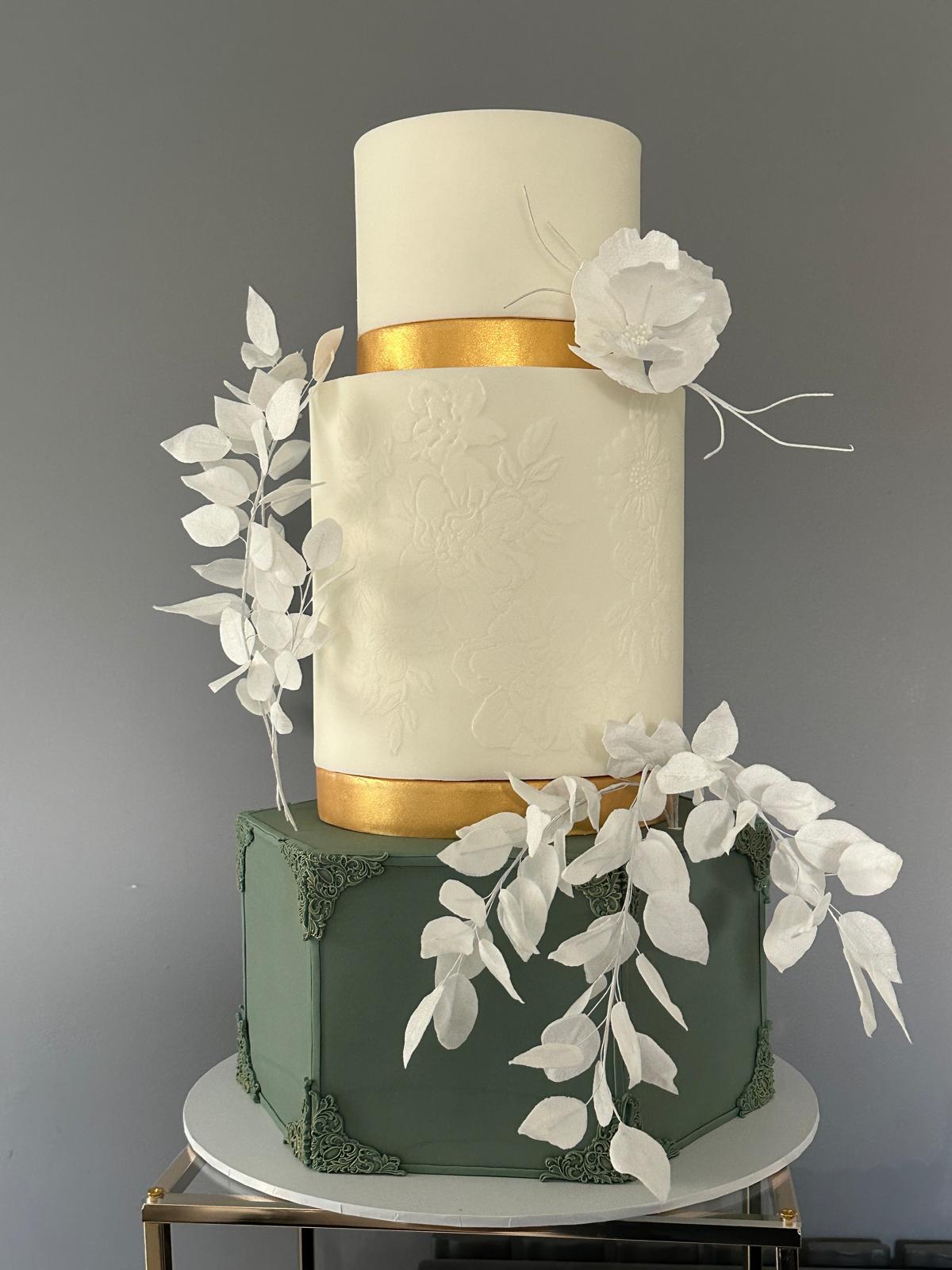 Elegant sage green and gold bespoke wedding cake with wafer paper flowers London